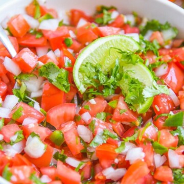 Authentic Pico de Gallo Recipe - By far the best pico de gallo recipe we've made. A fresh Salsa Fresca recipe for tacos, fajitas, and even with chips with fresh pico. (aka salsa with fresh tomatoes)