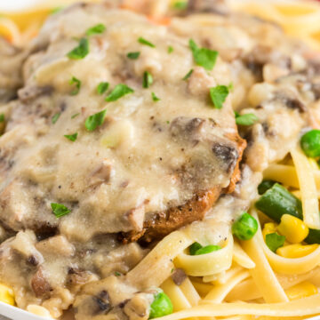 baked pork chops with cream of mushroom soup over pasta and veggies.