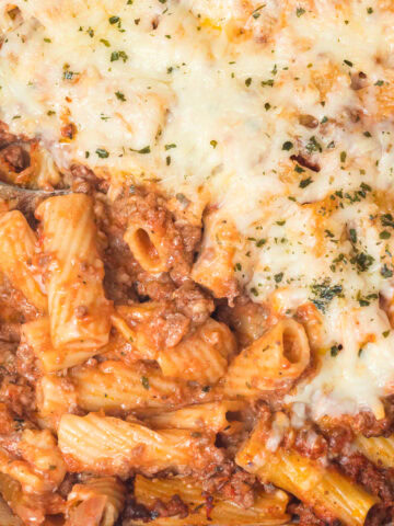 baked ziti without ricotta close up in casserole dish