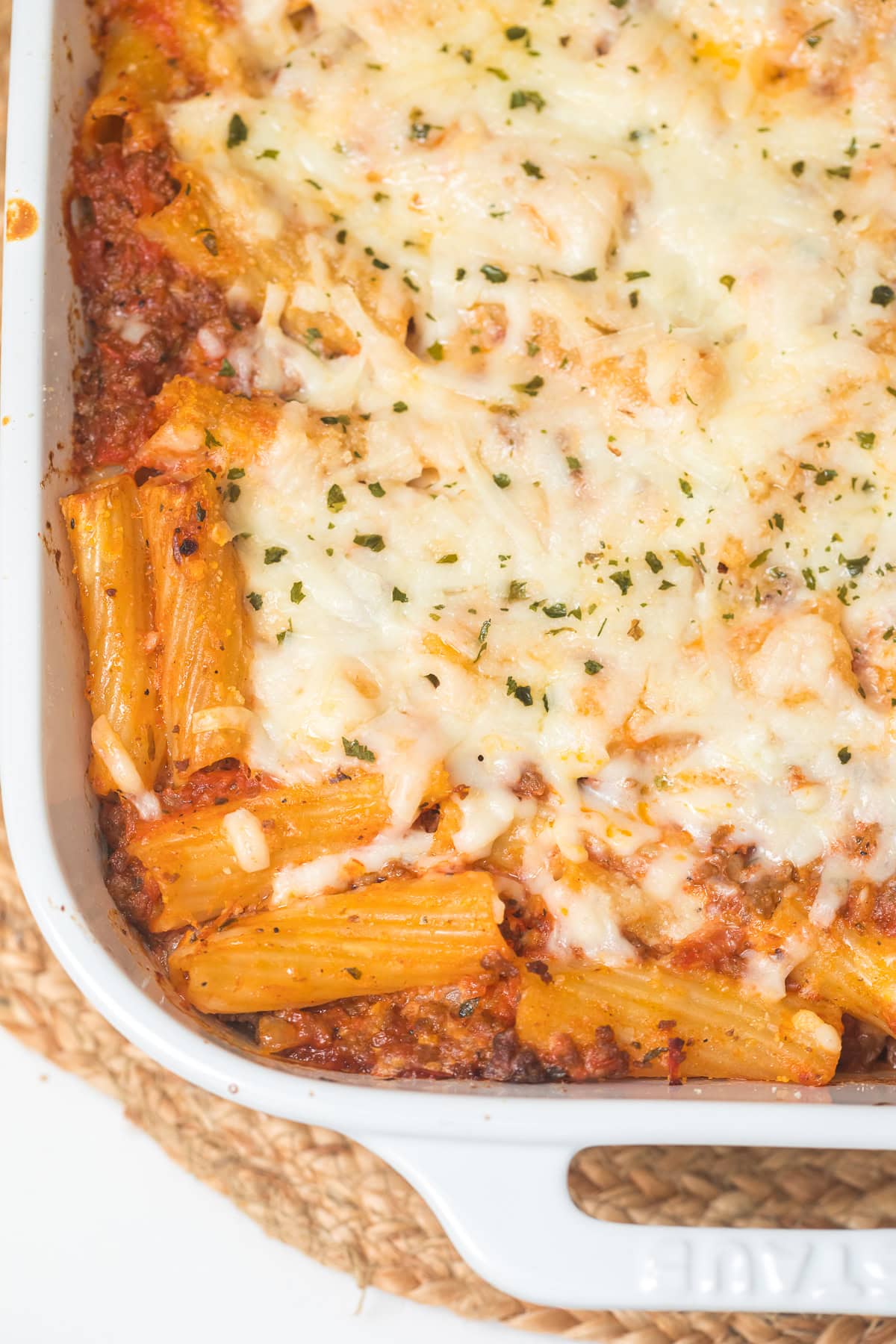 close up of baked ziti in casserole dish.