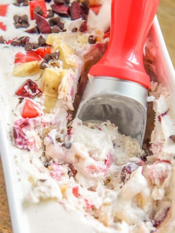 Our banana split ice cream recipe is filled with everything you would want in a homemade banana split, including the cherry on top! Scoop!