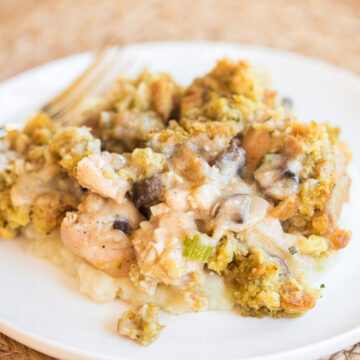 chicken and stuffing casserole on a white plate.