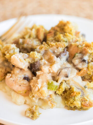 chicken and stuffing casserole on a white plate.