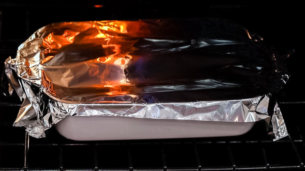 covered casserole in oven.