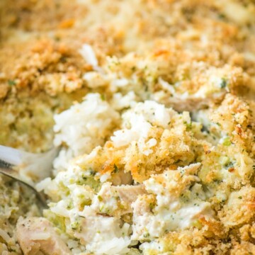 chicken broccoli rice casserole in a yellow baking dish