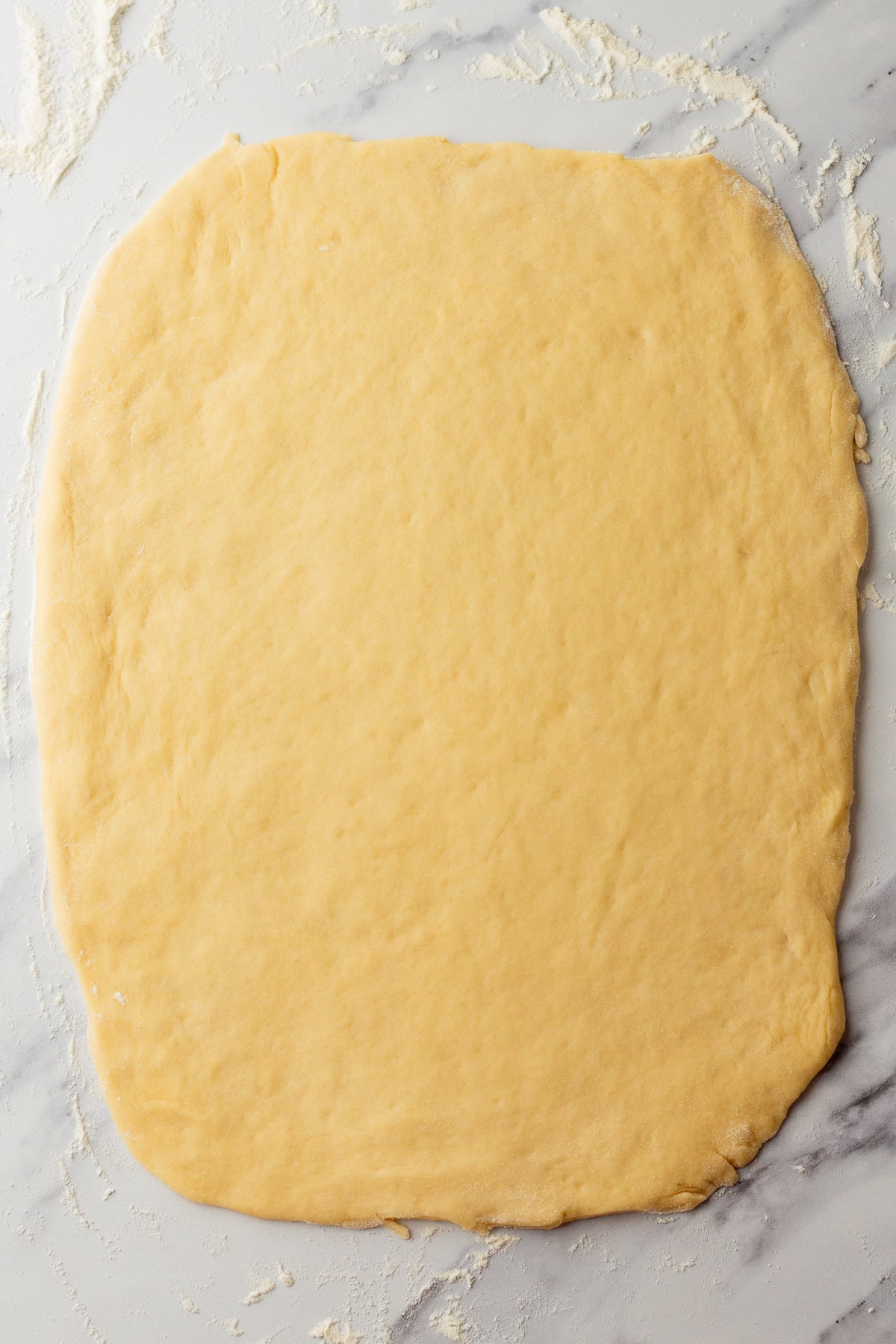 rolled out cinnamon roll dough.