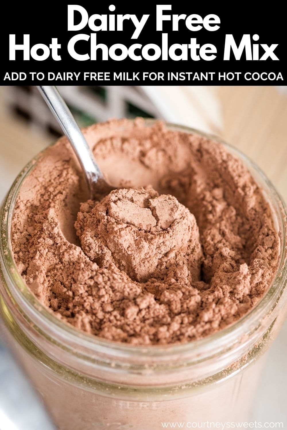 spoon in a mason jar with hot chocolate mix pinterest image with text