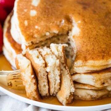 a fork full bite of dairy free pancakes.