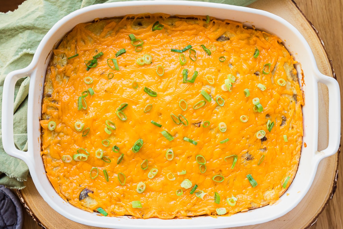 homemade breakfast casserole in a white casserole dish.