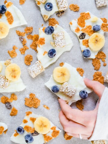 holding frozen yogurt bark breakfast cereal