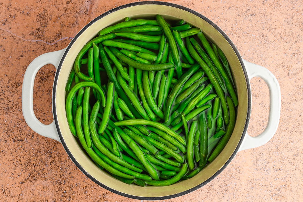 green beans in a pot of water.