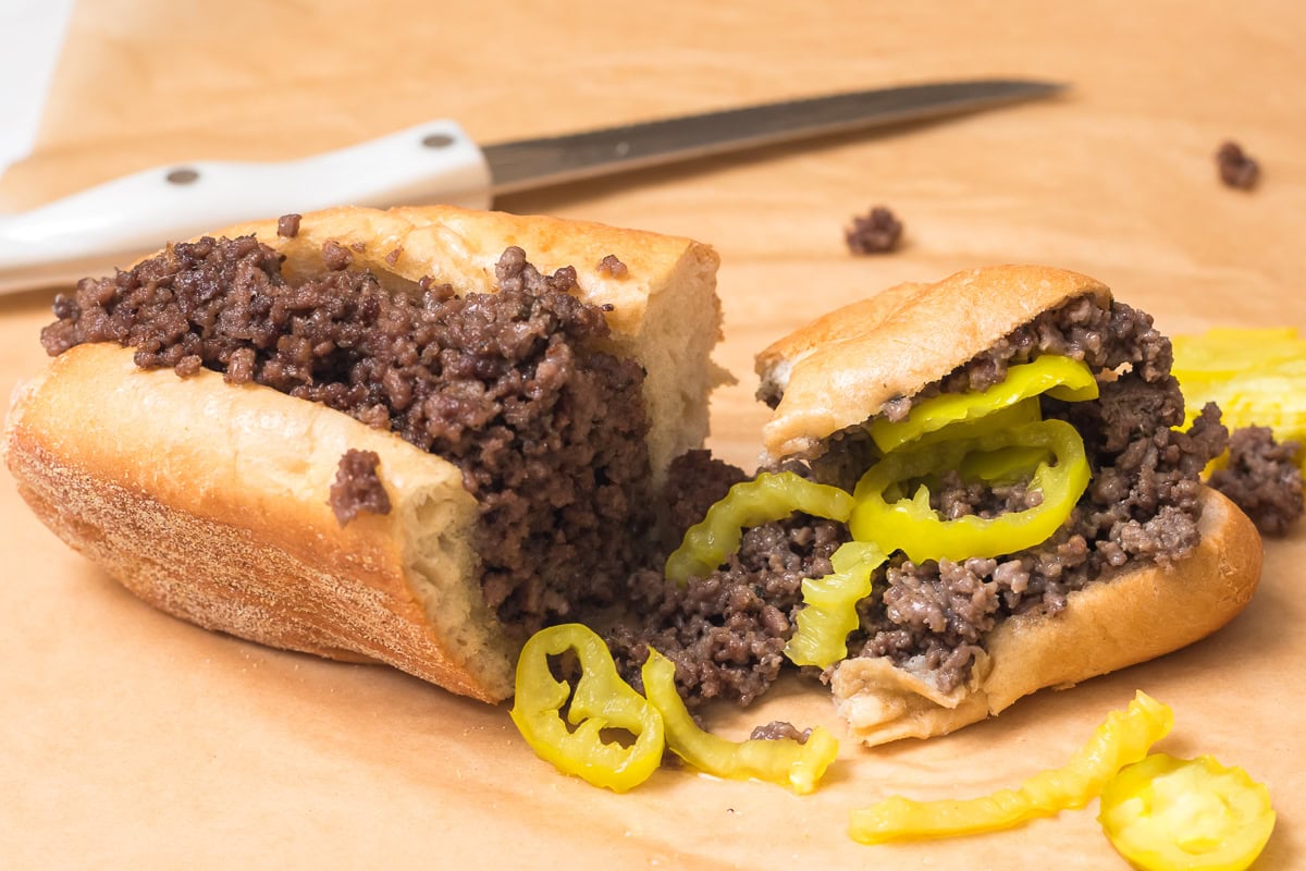 ground beef cheesesteak with banana peppers.