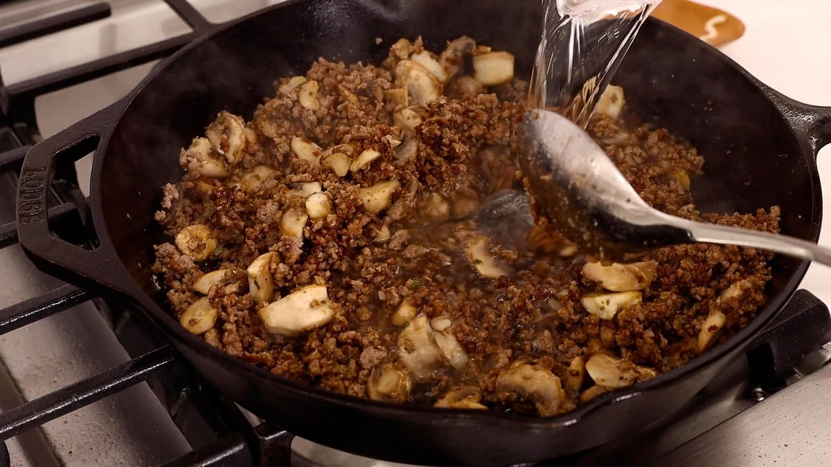 water added to skillet with ground beef mixture.