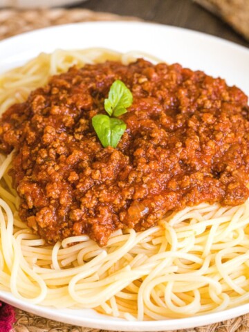 homemade spaghetti sauce over thin spaghetti.