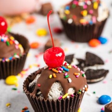 ice cream cupcakes with cherries on top