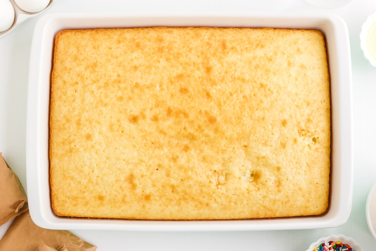 baked white cake in a 9x13 inch pan.