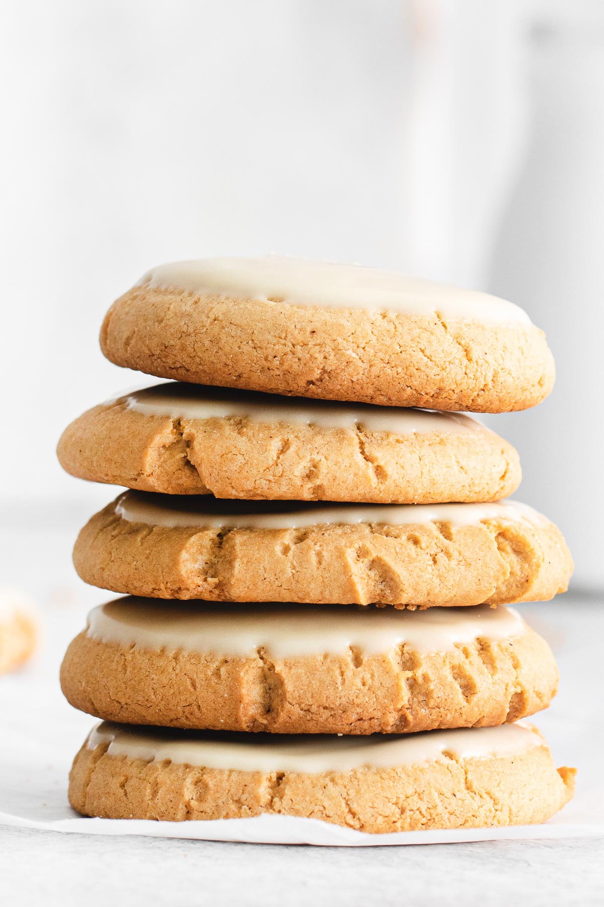 stacked maple cookies on top of eachother.