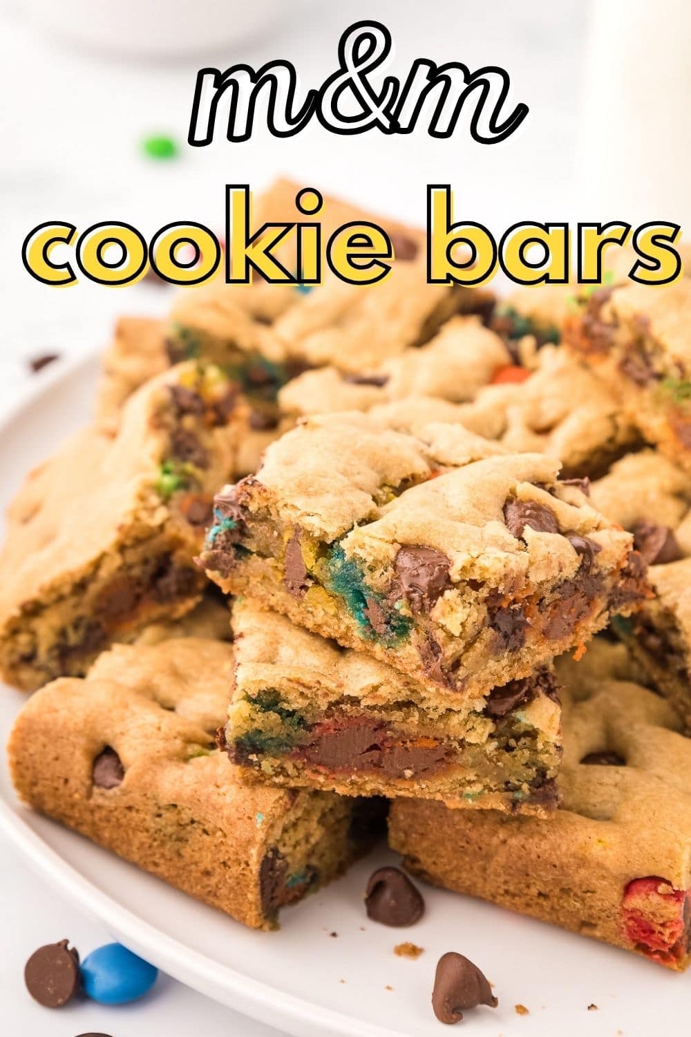 m&m cookie bars with text on image for pinterest saying m&m cookie bars.