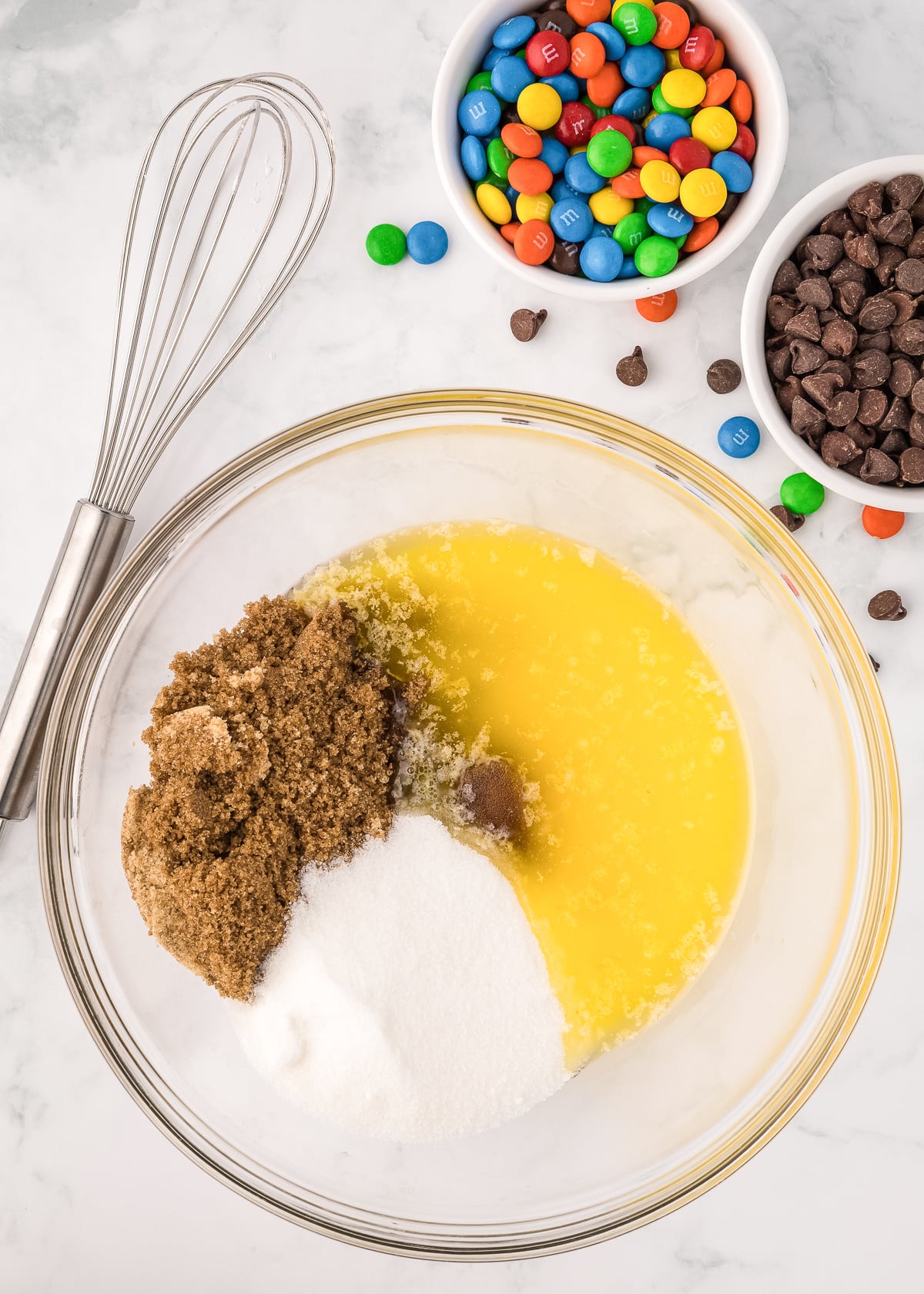 butter and sugars in a glass bowl.