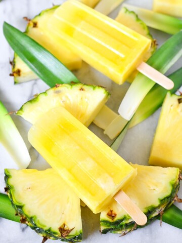 Refreshing and delicious Pineapple Lemonade Ice Pops! Make them fresh and healthy right at home for quick family friendly dessert!