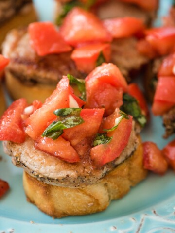 pork loin bruschetta toast appetizer on a plate