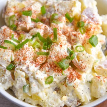 Quick and easy Potato Salad with Eggs Recipe is a great summer side dish for parties! Comfort food that is a family favorite for many!