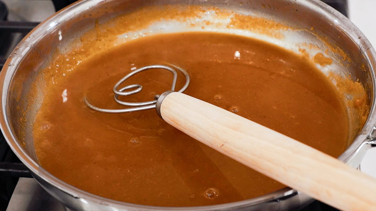 gravy in skillet with a danish wisk.