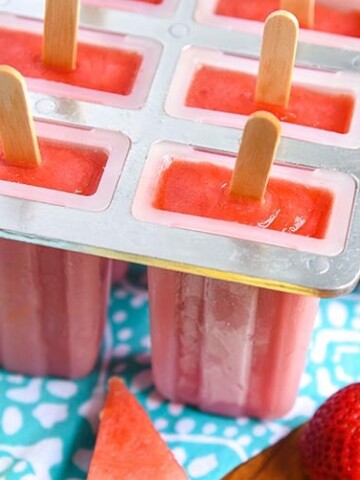 Nutritious Strawberry Watermelon Popsicles make for healthy and refreshing frozen summer dessert for kids! Easy to make recipe for kids on to Mini Chef Mondays and perfect to hydrate them on a hot summer day.