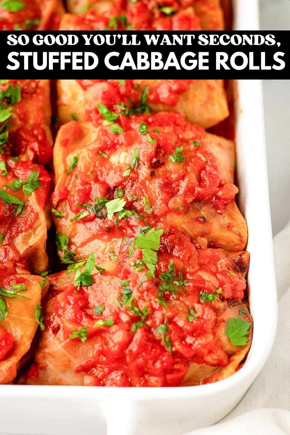 stuffed cabbage rolls in a casserole with text on image for pinterest saying so good you'll want seconds stuffed cabbage rolls.