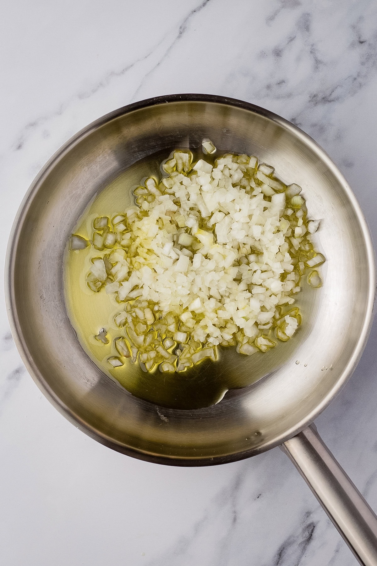 saute onions and garlic in a pan with oil.