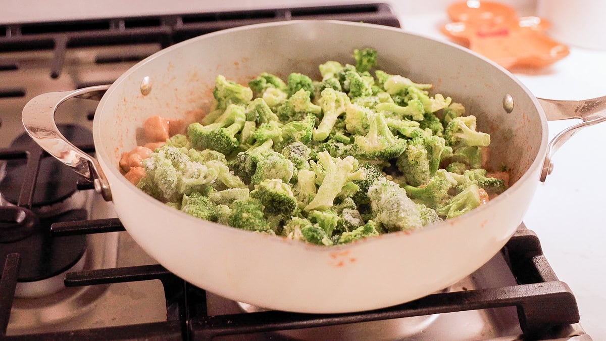 frozen broccoli over cooked pork.