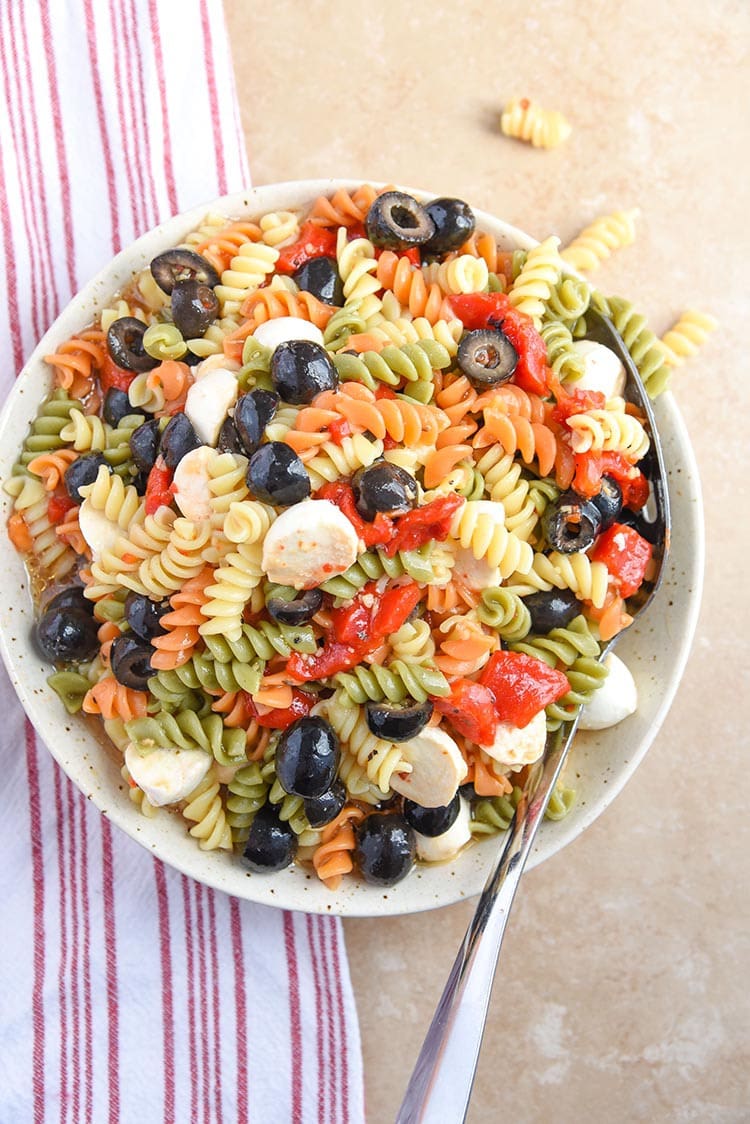 COLORFUL Tri Color Pasted Salad is a hit! I'm always asked to make this tri colored pasta salad for parties and it's the best cold salad without mayo!