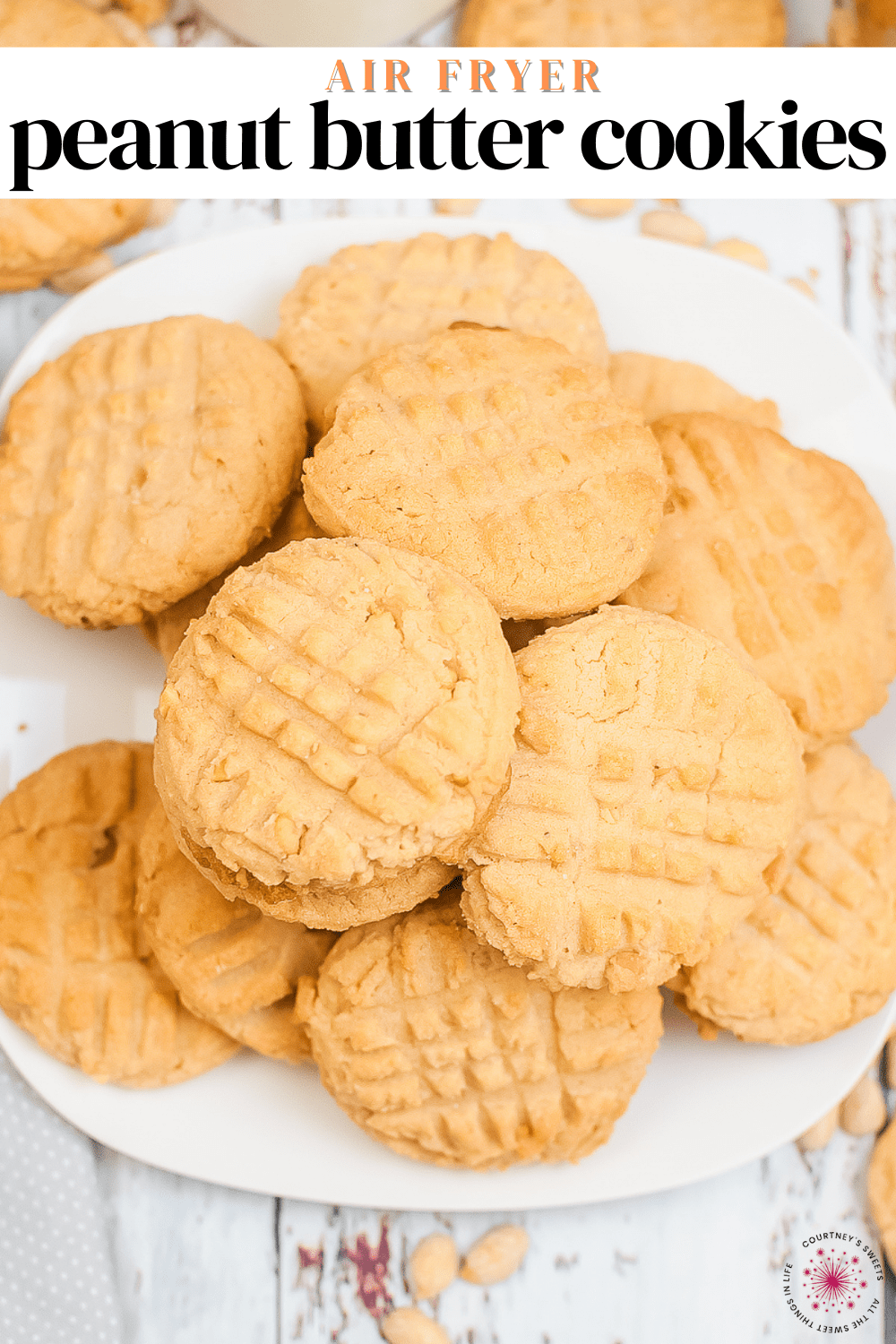 air fryer peanut butter cookies on a white plate with text for pinterest.