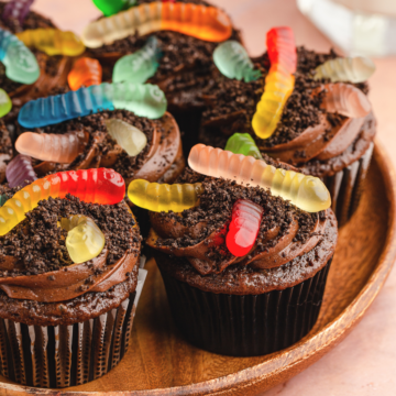 dirt cupcakes with gummy worms on then.